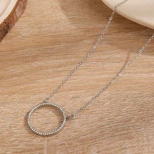 Diamond decor circle charm necklace